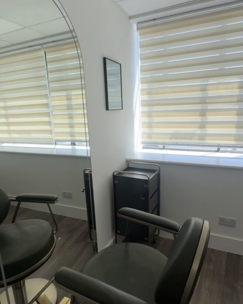 The studio seen from the doorway, with the chair and basin.